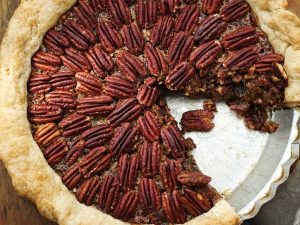 pecan pie with slice cut out