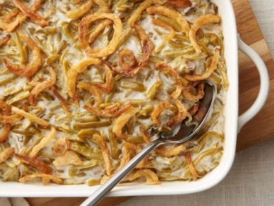 corner view of green bean casserole with spoon