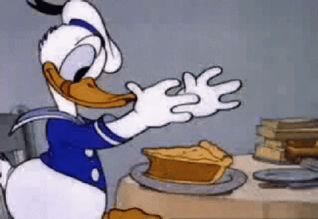 donald duck eating a whole slice of pie