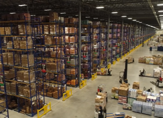 inside a fully stocked H-E-B warehouse