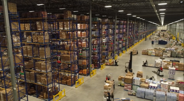inside a fully stocked H-E-B warehouse