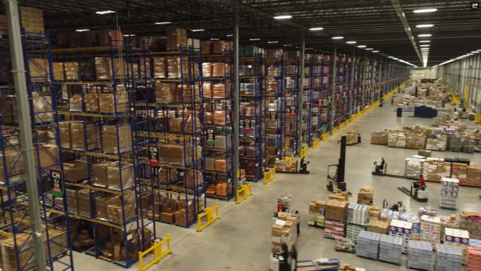 inside a fully stocked H-E-B warehouse