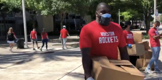 houston rockets employees handing out free groceries and meals