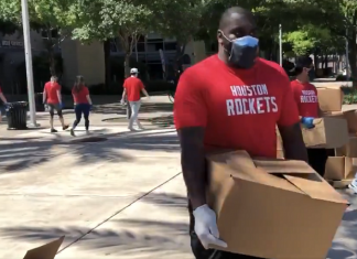 houston rockets employees handing out free groceries and meals