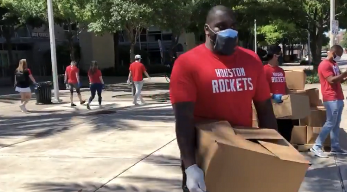 houston rockets employees handing out free groceries and meals