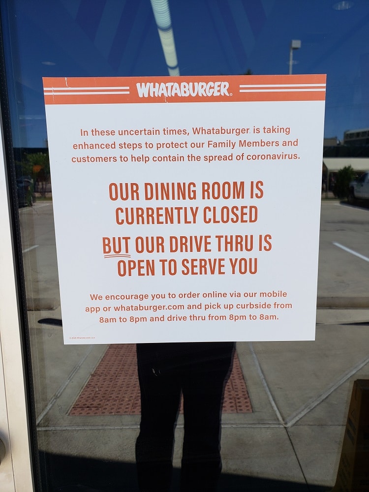 whataburger dining room closed due to pandemic sign on door