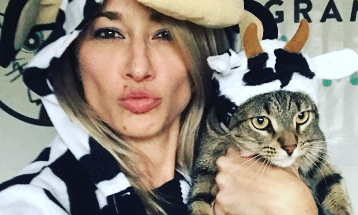 instagram cat lady and her cat in cow costumes