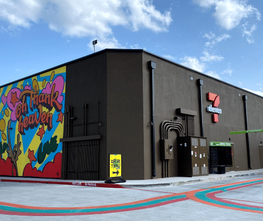 7-Eleven drive thru and mural