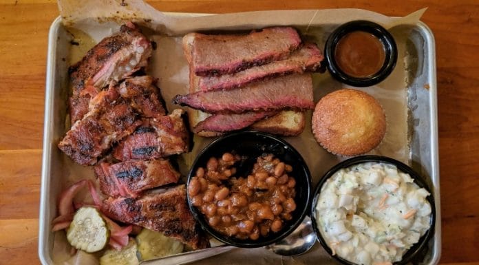 BBQ barbeque plate on a tray on a wooden table