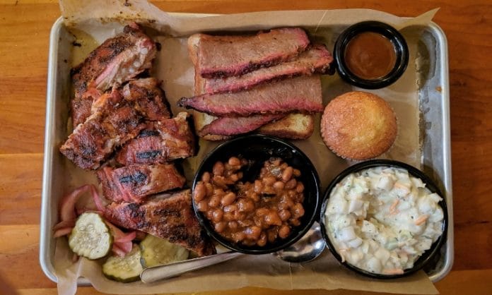 BBQ barbeque plate on a tray on a wooden table