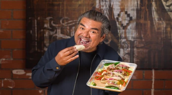 George Lopez eating one of his badass tacos