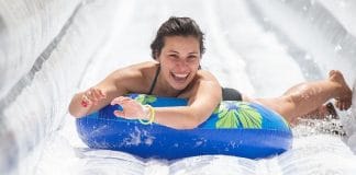 texas lady sliding down slip and slide at slide the slopes event in new braunfels texas 2021