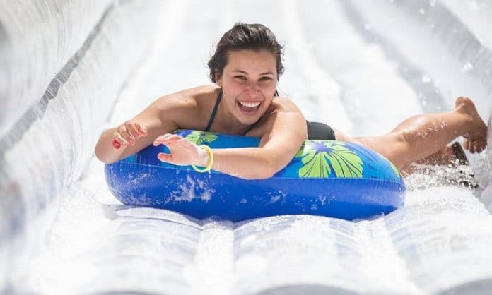 texas lady sliding down slip and slide at slide the slopes event in new braunfels texas 2021