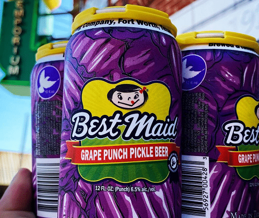 martin house grape punch pickle beer cans in a hand