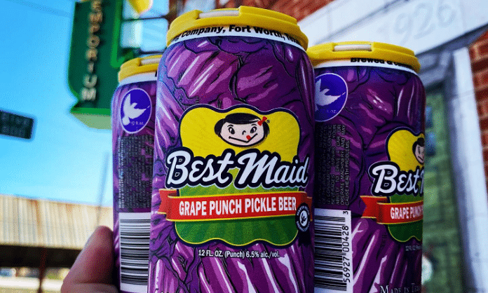 martin house grape punch pickle beer cans in a hand