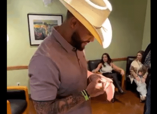 dak prescott autographing football at country fest 2021 in grand prairie, tx