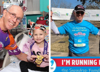 Larry DeSpain Texas runner smiling next to child cancer patient