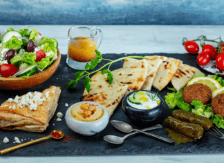 The Great Greek Mediterranean Grill food array on a table