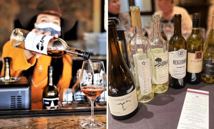 woman in a cowboy hat pouring wine and a line of open Texas Hill Country wines