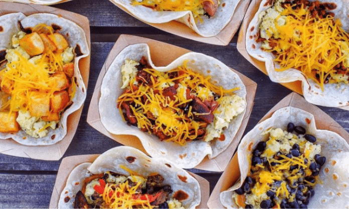 variety of tacos in trays