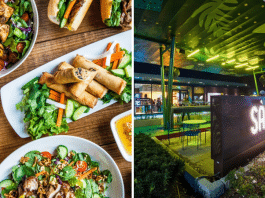 Vietnamese food on a table and Saigon Hustle neon sign on Houston patio