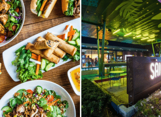 Vietnamese food on a table and Saigon Hustle neon sign on Houston patio