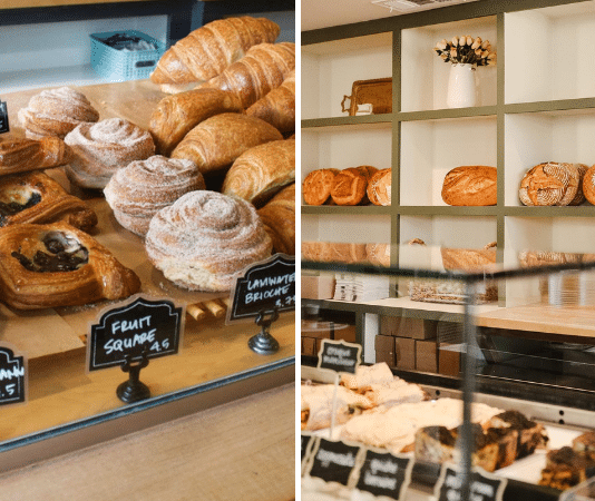 front shop of a cafe bakery with pastries for sale and a wall of baked bread from Village Baking Co in Dallas, TX