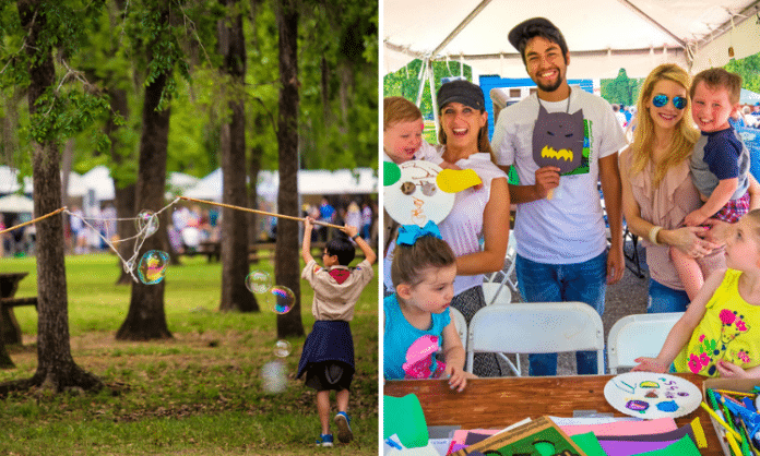 kid making bubbles and people around a crafts table smiling