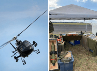 helicopter flying sideways and a booth of military antiques