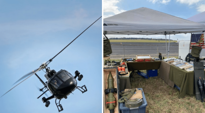 helicopter flying sideways and a booth of military antiques