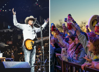 people in a crowd holding up theirs drinks to the stage and a man playing guitar on stage