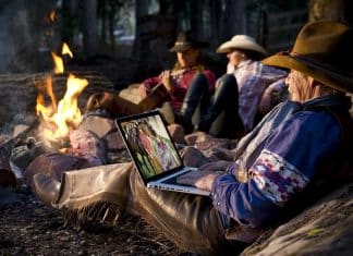 cowboys laptop campfire