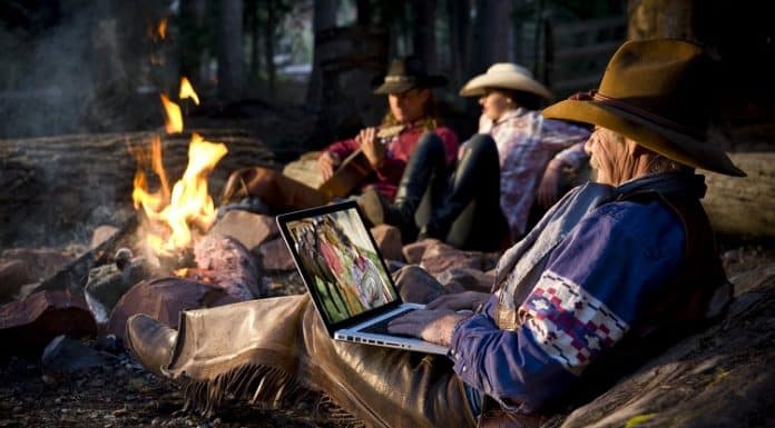 cowboys laptop campfire