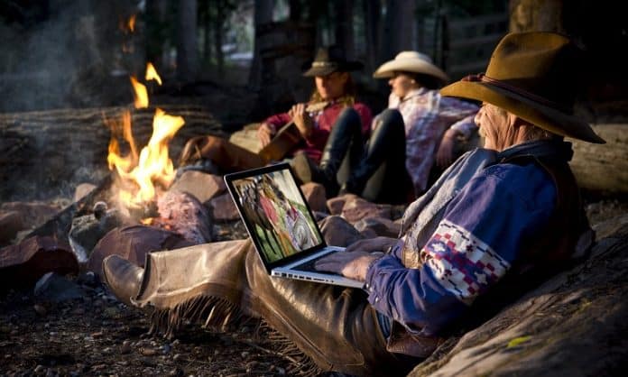 cowboys laptop campfire