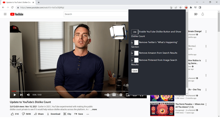 screenshot of youtube dislike count added back by browser extension on a laptop