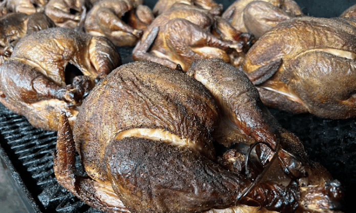 smoked turkeys on a texas-style smoker